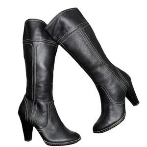 Black vintage soft leather mid-calf boots.